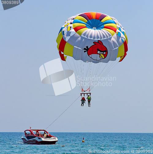 Image of Parasailing in a blue sky 