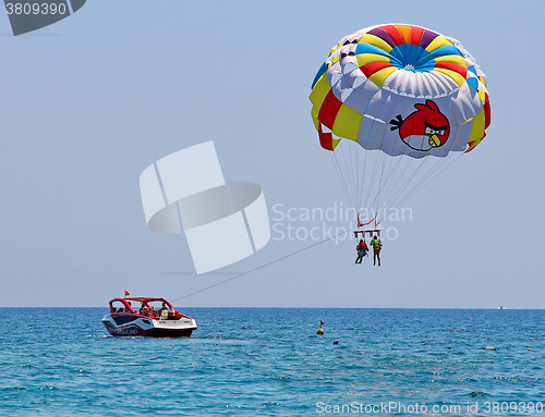Image of Parasailing in a blue sky 