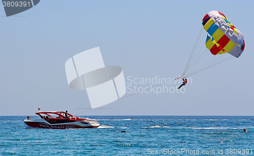 Image of Parasailing in a blue sky 