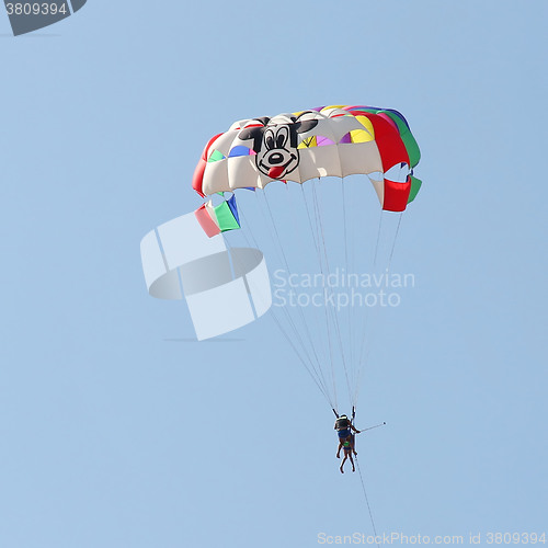 Image of Parasailing in a blue sky 