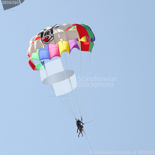 Image of Parasailing in a blue sky 