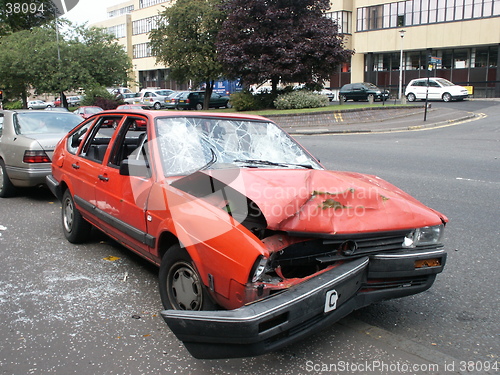 Image of Crash Damaged Red Car