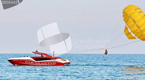 Image of Parasailing in a blue sky