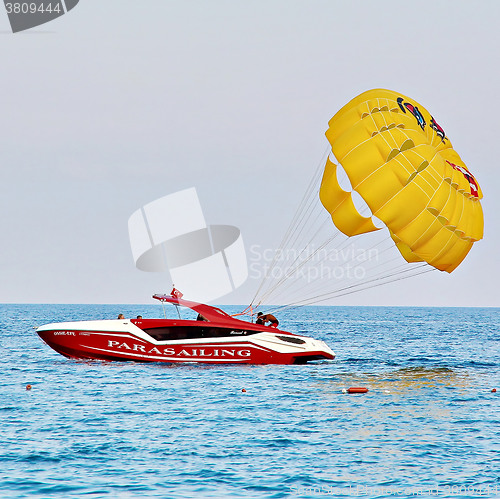 Image of Parasailing in a blue sky