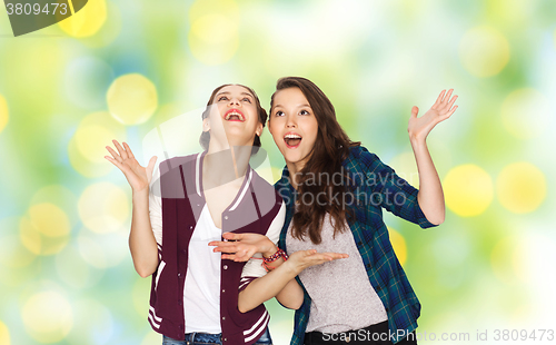 Image of happy smiling pretty teenage girls having fun