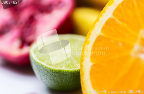 Image of close up of fresh juicy orange and lime