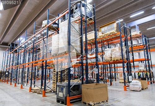 Image of cargo boxes storing at warehouse shelves