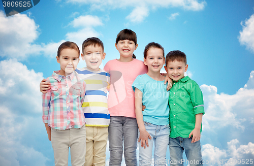 Image of happy smiling little children hugging