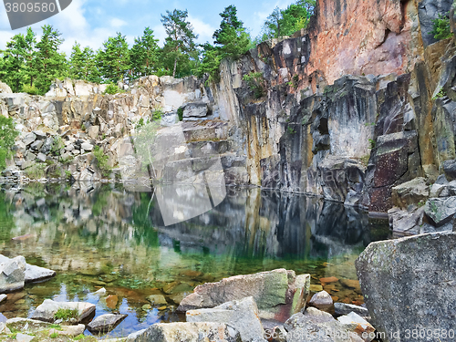 Image of Picturesque lake in the ancient stone quarry