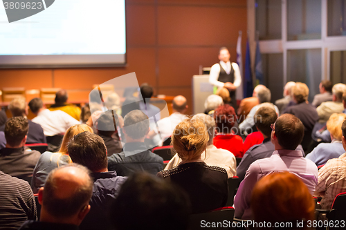 Image of Speaker at Business Conference and Presentation.