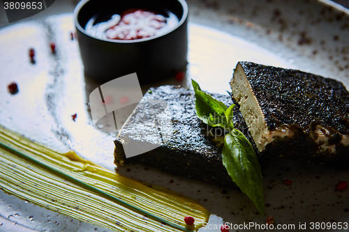 Image of Tofu fried in nori. Served with sauce