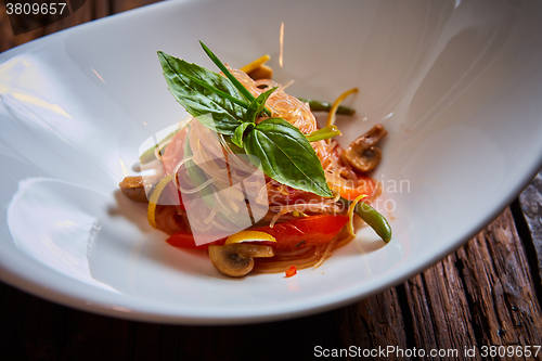 Image of Glass noodles with mushrooms and vegetables. 