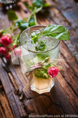 Image of fresh mojito on a rustic table