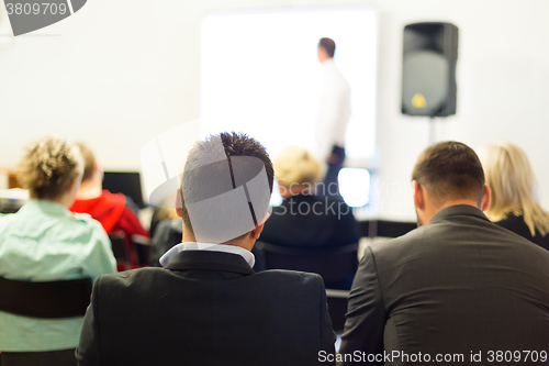 Image of Speaker at Business Workshop. 