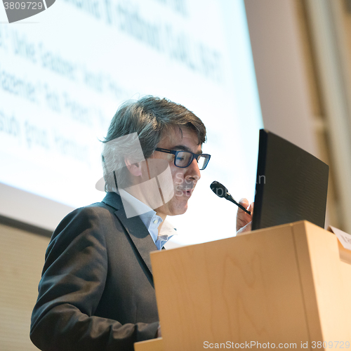 Image of Speaker giving talk at Business Conference.