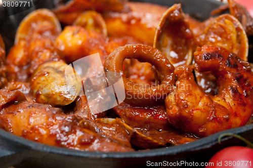 Image of fresh seafoos stew on an iron skillet