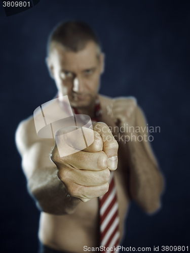 Image of business man fighting