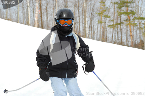 Image of Girl skiing downhill