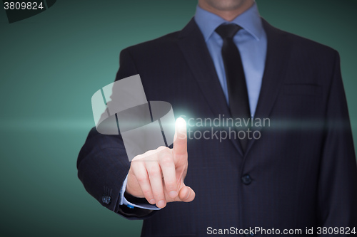 Image of business, technology, internet and networking concept - businessman pressing button with contact on virtual screens. 