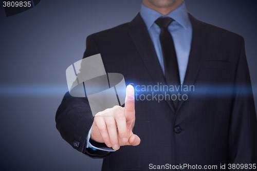 Image of business, technology, internet and networking concept - businessman pressing button with contact on virtual screens. 
