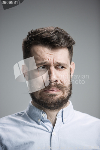 Image of portrait of disgusted man