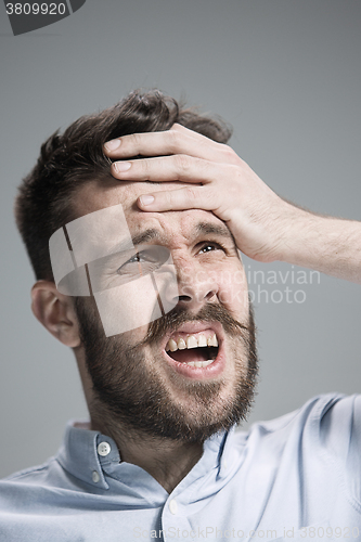 Image of Close up face of desperate man 