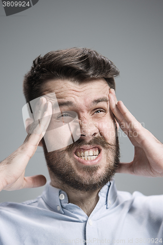 Image of Close up face of desperate man 