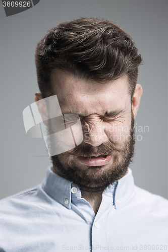 Image of The crying man with tears on face closeup