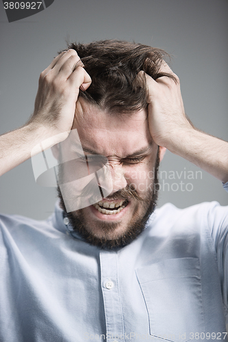 Image of Close up face of desperate man 