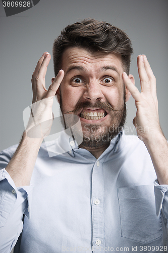 Image of Close up face of desperate man 