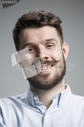 Image of The  young man looking at camera 