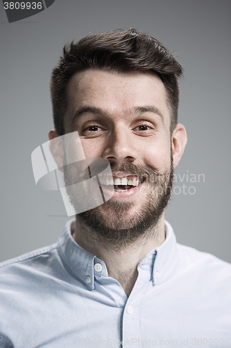 Image of The  young man looking at camera 