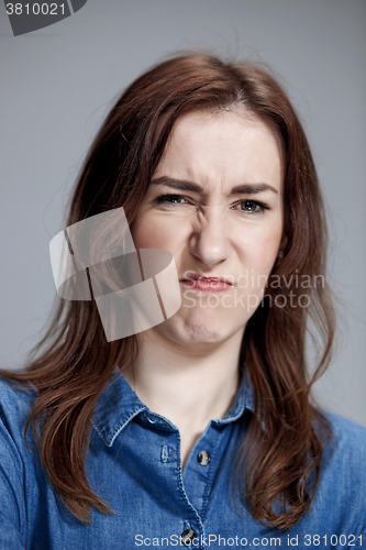 Image of portrait of disgusted woman