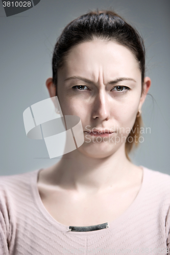 Image of The portrait of a beautiful sad girl closeup