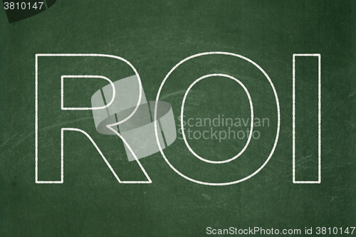 Image of Finance concept: ROI on chalkboard background