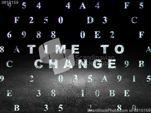 Image of Time concept: Time to Change in grunge dark room