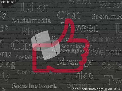 Image of Social media concept: Thumb Up on wall background