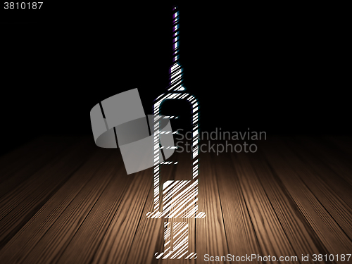Image of Health concept: Syringe in grunge dark room