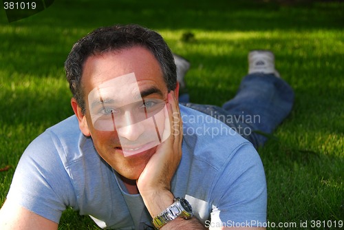 Image of Man relaxing outside