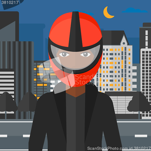 Image of Woman in biker helmet.