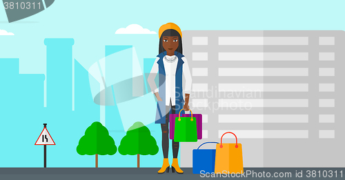 Image of Buyer with shopping bags.