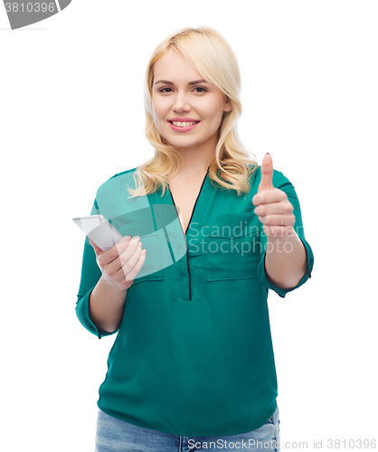 Image of happy woman with smartphone texting message