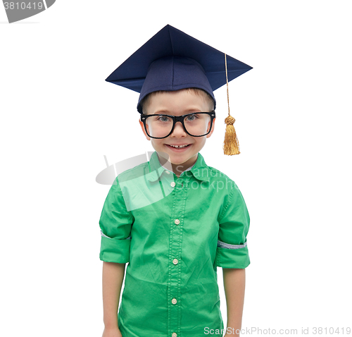 Image of happy boy in bachelor hat or mortarboard