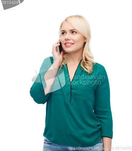 Image of happy young woman calling on smartphone