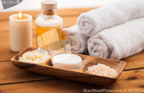 Image of close up of soap, himalayan salt and scrub in bowl