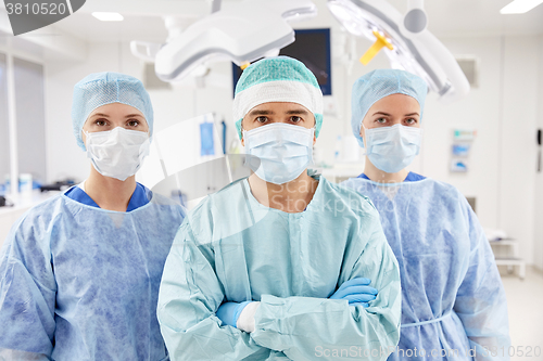 Image of group of surgeons in operating room at hospital