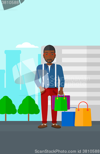 Image of Buyer with shopping bags.