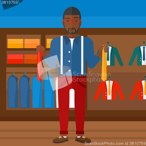 Image of Customer choosing neckties.