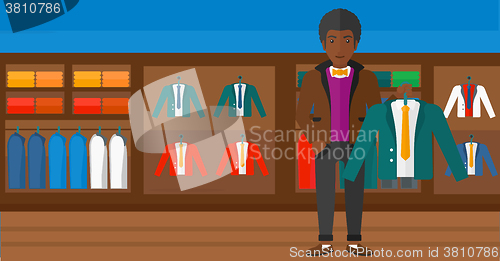 Image of Man holding jacket.