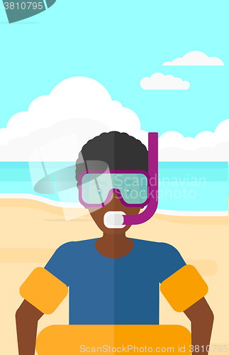Image of Man with swimming equipment.